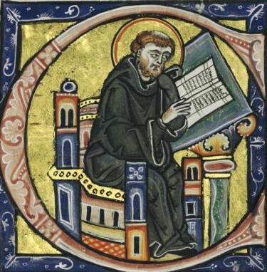 ein lesender Mönch in einer illuminierten Majuskel